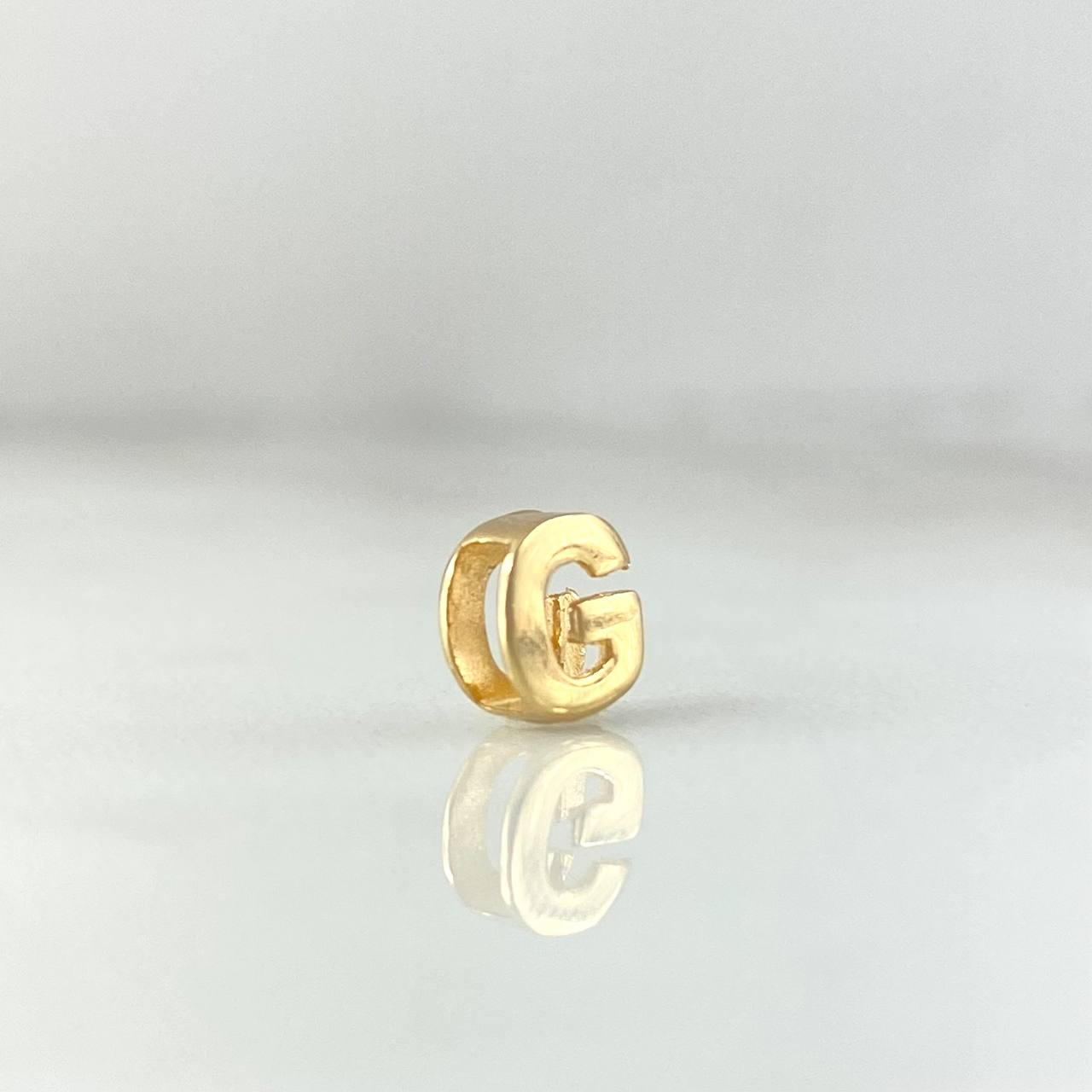 Herraje Letra G 0.4gr / 6mm Tambor Oro Amarillo 18K