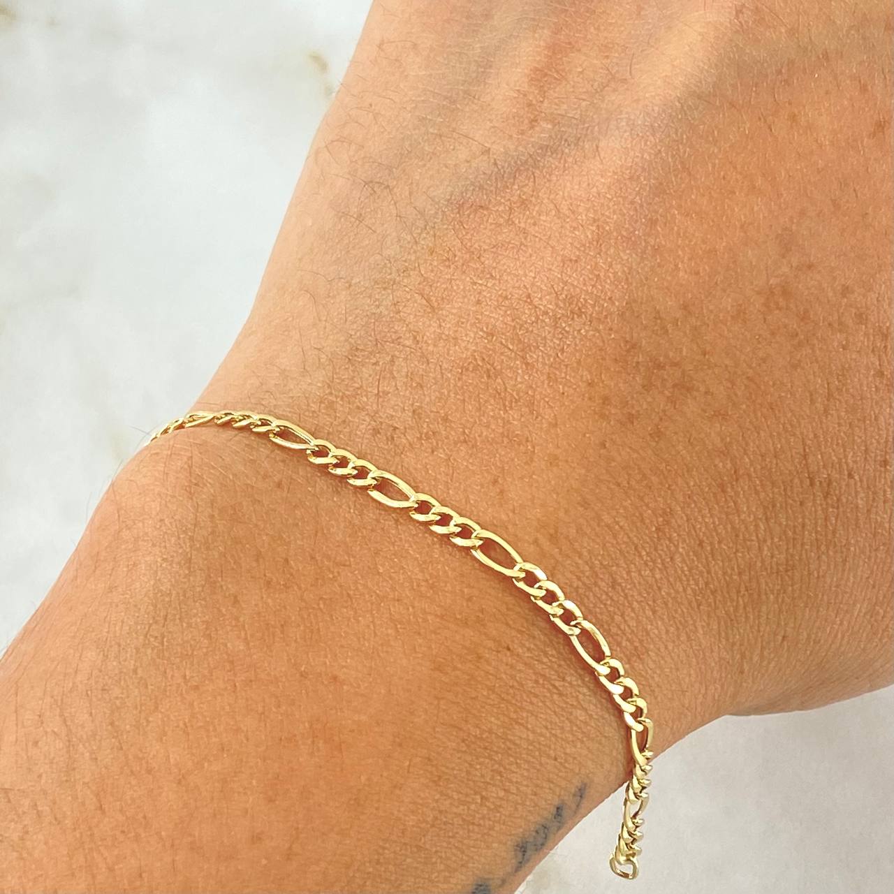 Figaro Bracelet 0.95gr / 19cm / +1 18K Gold *