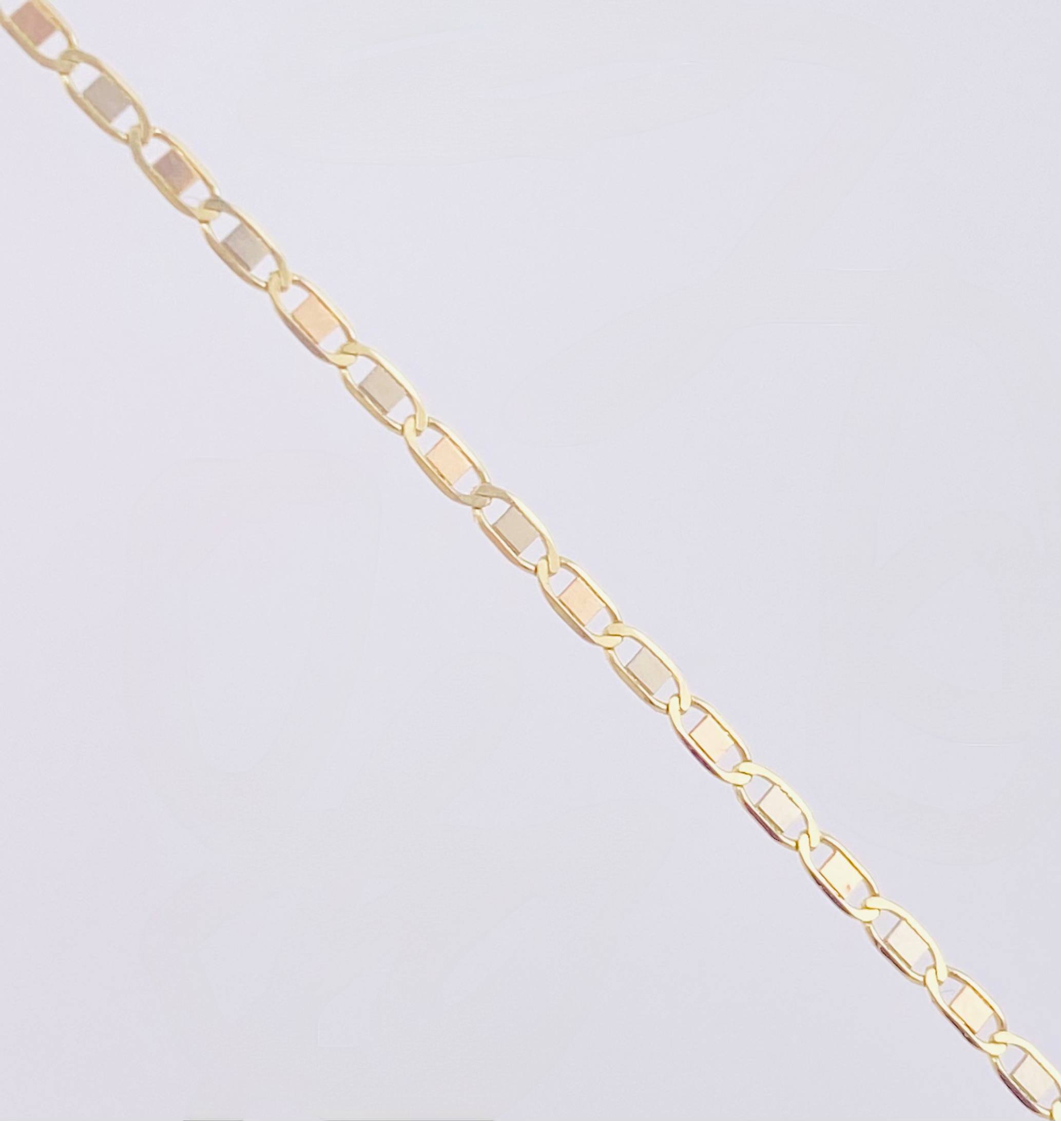 Cadena Plana 1.5gr / 17 3/4 in / 1.3mm Oro Amarillo +3 18K ©
