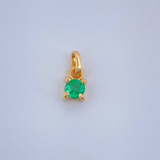 Dije Redondo Esmeralda 0.25gr / 1/2 in / Oro Amarillo 18K %