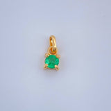 Dije Redondo Esmeralda 0.25gr / 1/2 in / Oro Amarillo 18K %