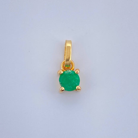 Dije Circular Esmeralda 0.5gr / 1/2 in / Oro Amarillo 18K %