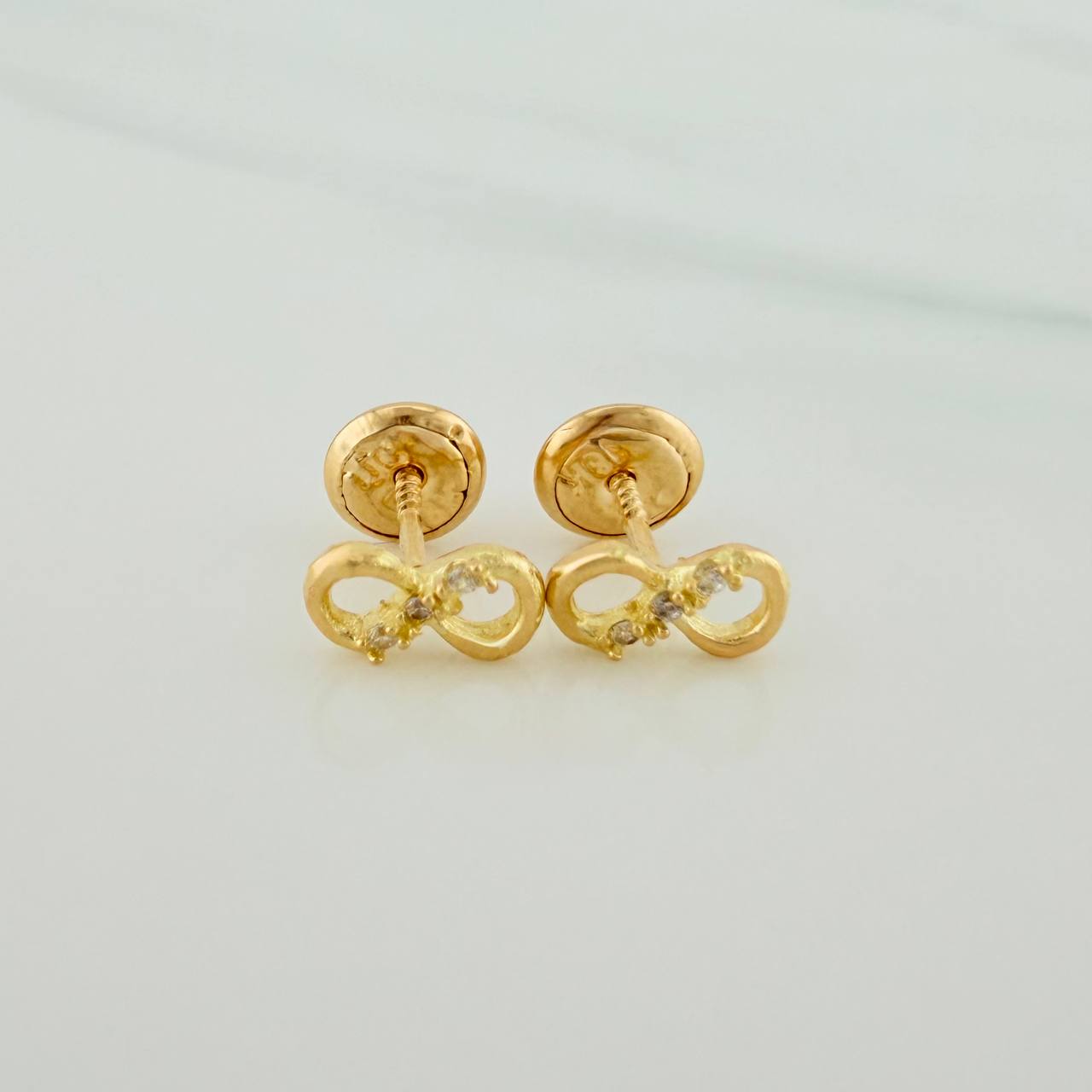 Topos Infinito 0.7gr / Oro Amarillo 18K &