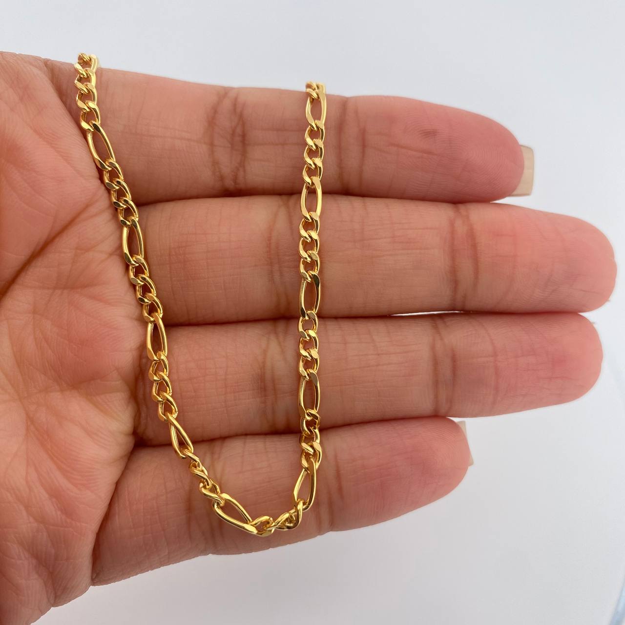 Cadena Figaro 6.5gr / 23 1/2 in / 2.93mm Oro Amarillo +1 18K $