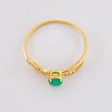 Anillo Solitario Entrelazado Esmeralda 19pts Rubíes 5pts 1.8g / T6 1/4 Oro Amarillo 18K