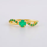 Intertwined Solitaire Ring with Emeralds 27pts 1.9g / T7 1/4 18K Yellow Gold