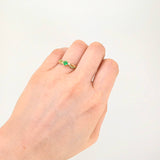 Intertwined Solitaire Ring with Emeralds 27pts 1.9g / T7 1/4 18K Yellow Gold