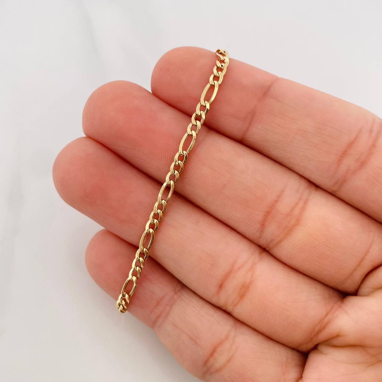Figaro Bracelet 1g / 7 3/4 in / 2.55mm 18K Yellow Gold
