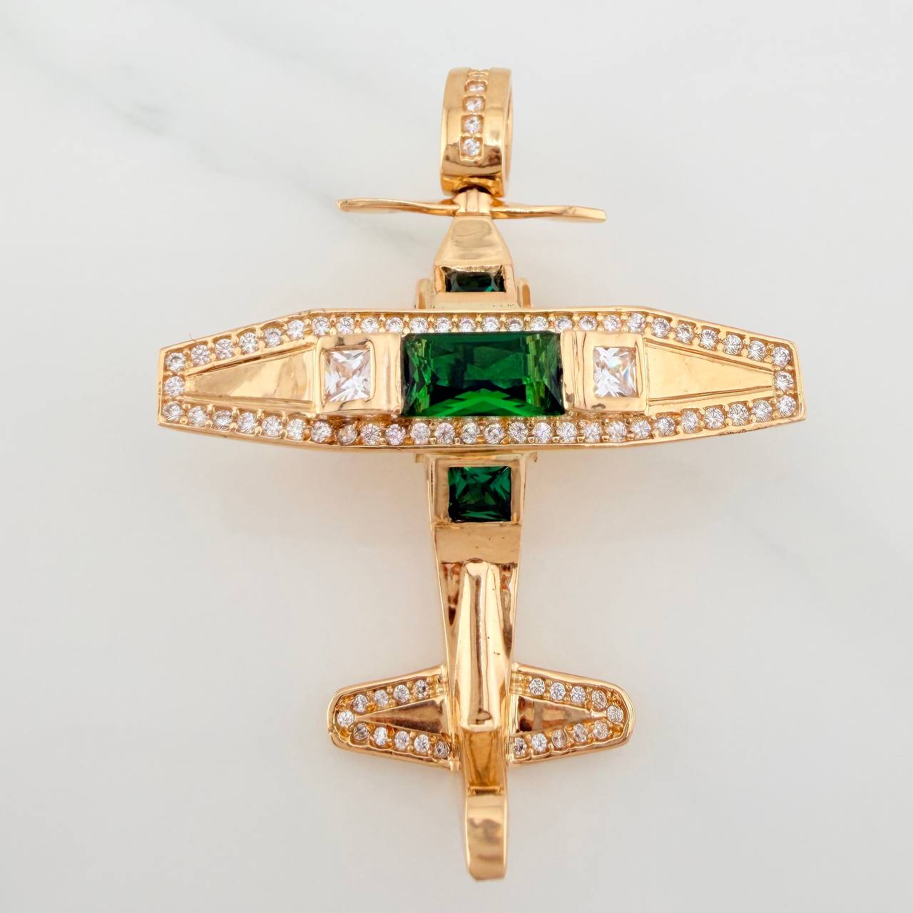 Dije Avioneta Articulada 18gr / 2 in / Oro Amarillo 18K $