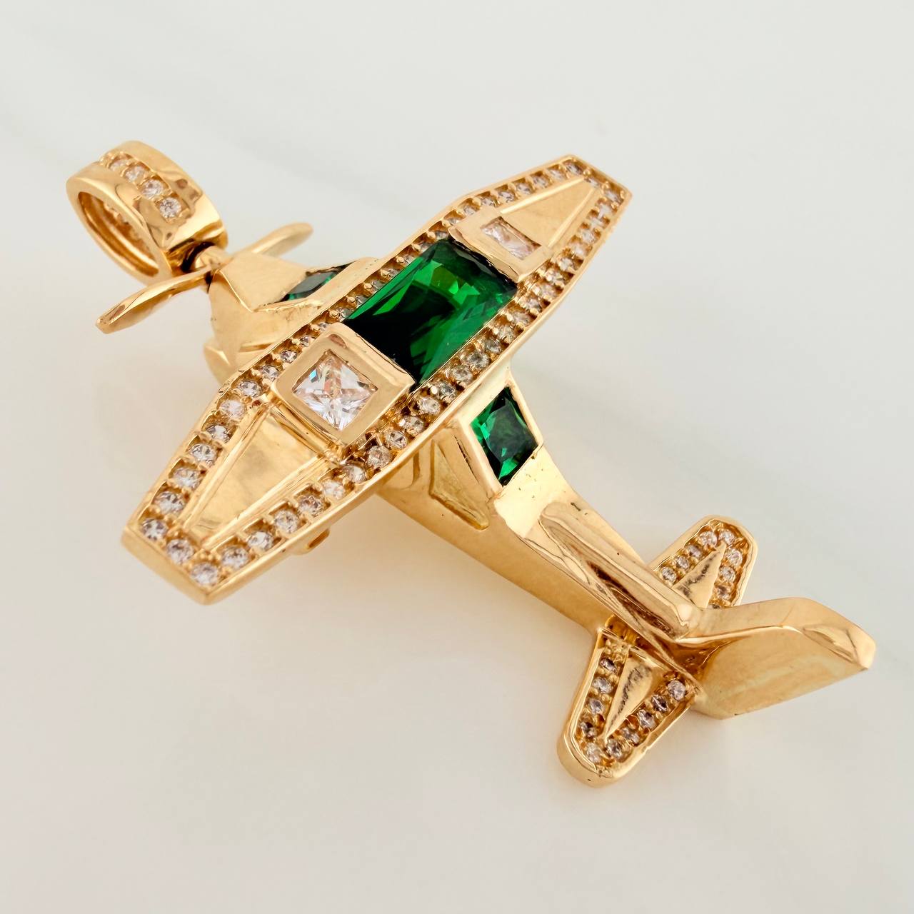 Dije Avioneta Articulada 18gr / 2 in / Oro Amarillo 18K $