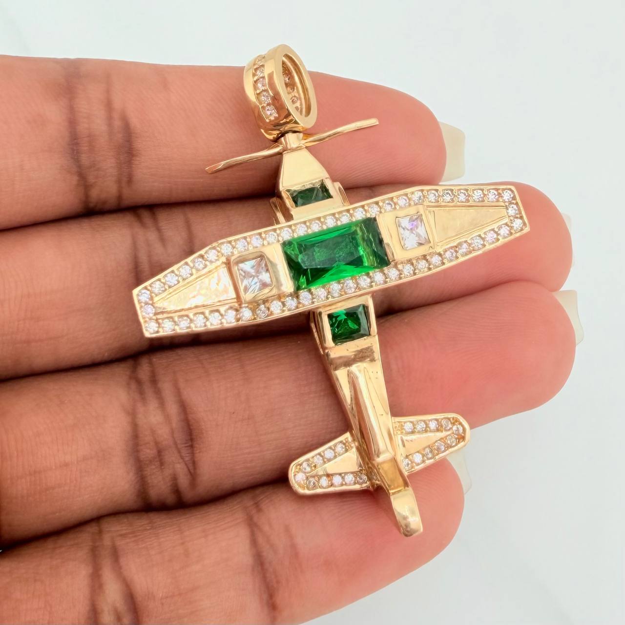 Dije Avioneta Articulada 18gr / 2 in / Oro Amarillo 18K $