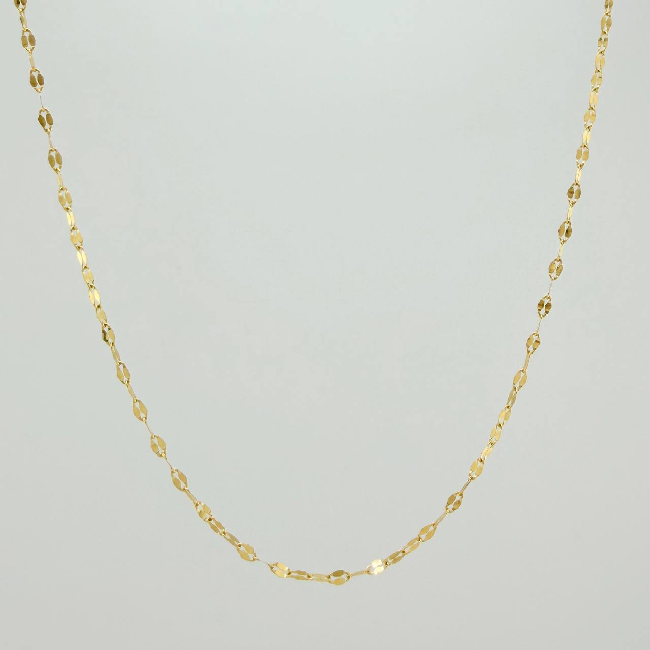 Cadena Flor Espejo 1.15gr / 23 3/4 in / 0.9mm Oro Amarillo +3 18K %