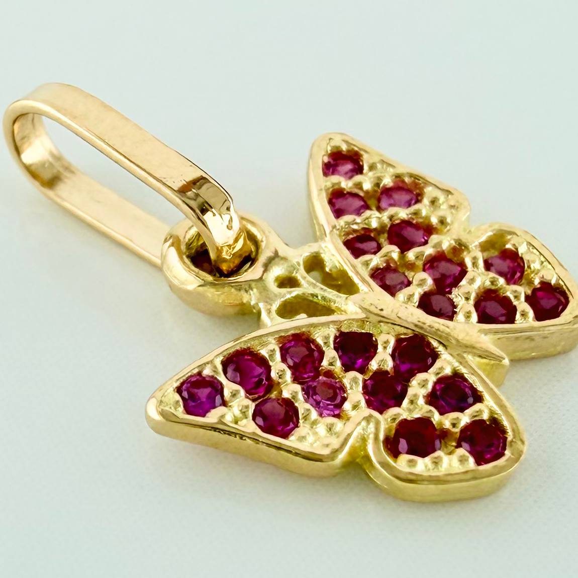 Dije Mariposa 0.7 g / 1/2 in Oro Amarillo 18K