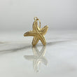 Dije Estrella De Mar 0.95gr / 2.4cm Troquelado Oro Amarillo