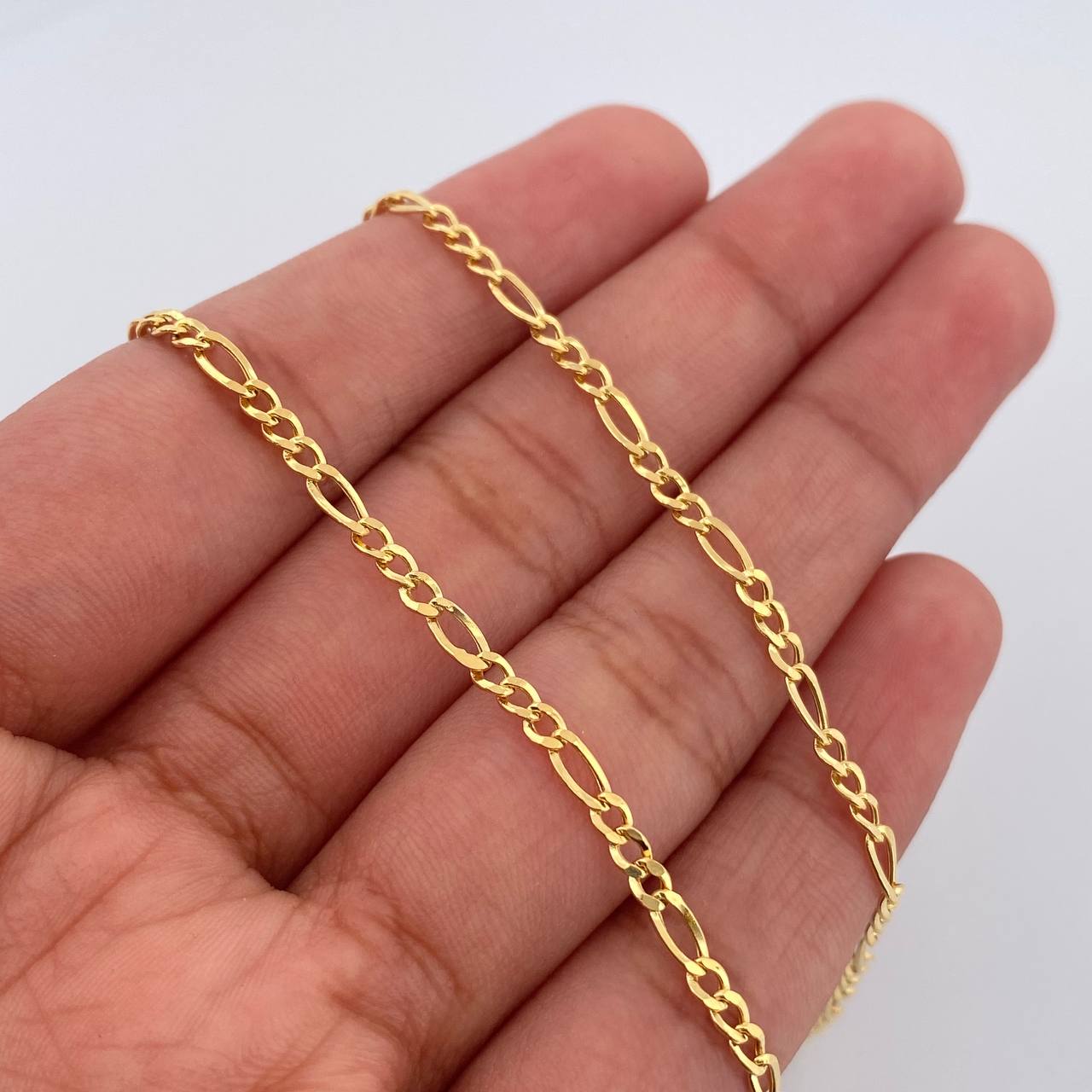 Cadena Figaro 3.25gr / 23 1/2 in / 2.2mm Oro Amarillo +1 18K %