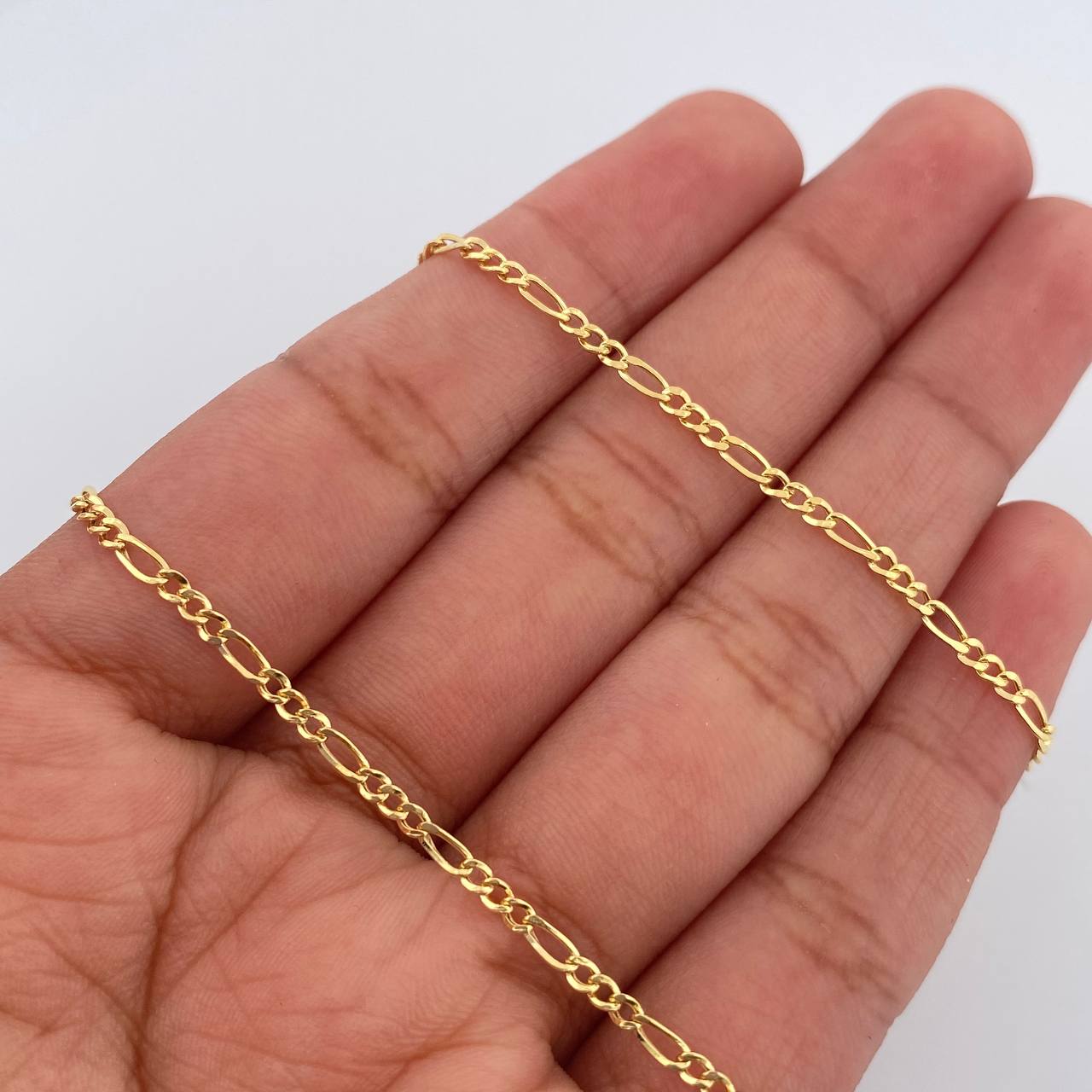 Cadena Figaro 1.7gr / 17 3/4 in / 1.5mm Oro Amarillo +1 18K &