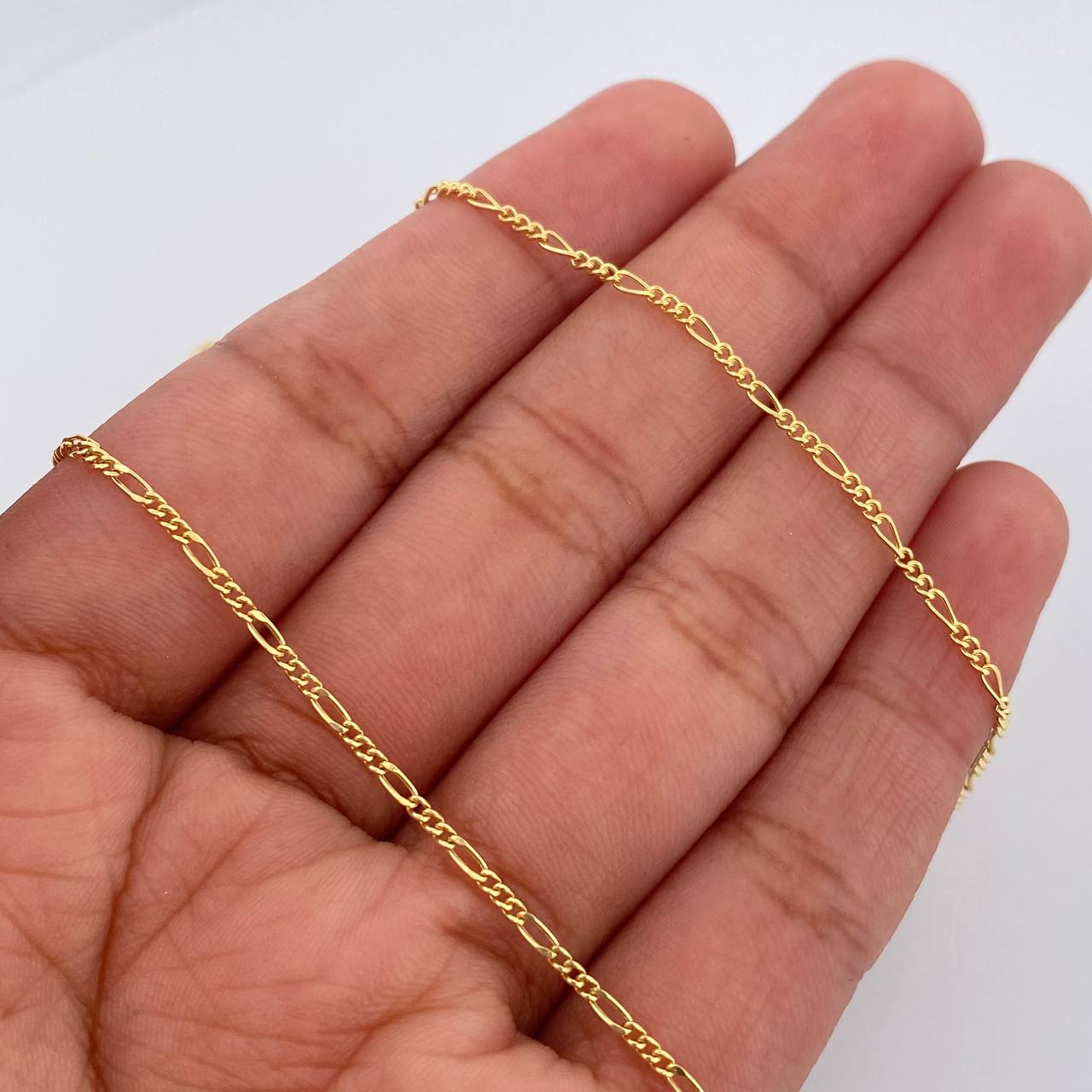 Cadena Figaro 1.5gr / 20 in / 1.4mm Oro Amarillo +1 18K $