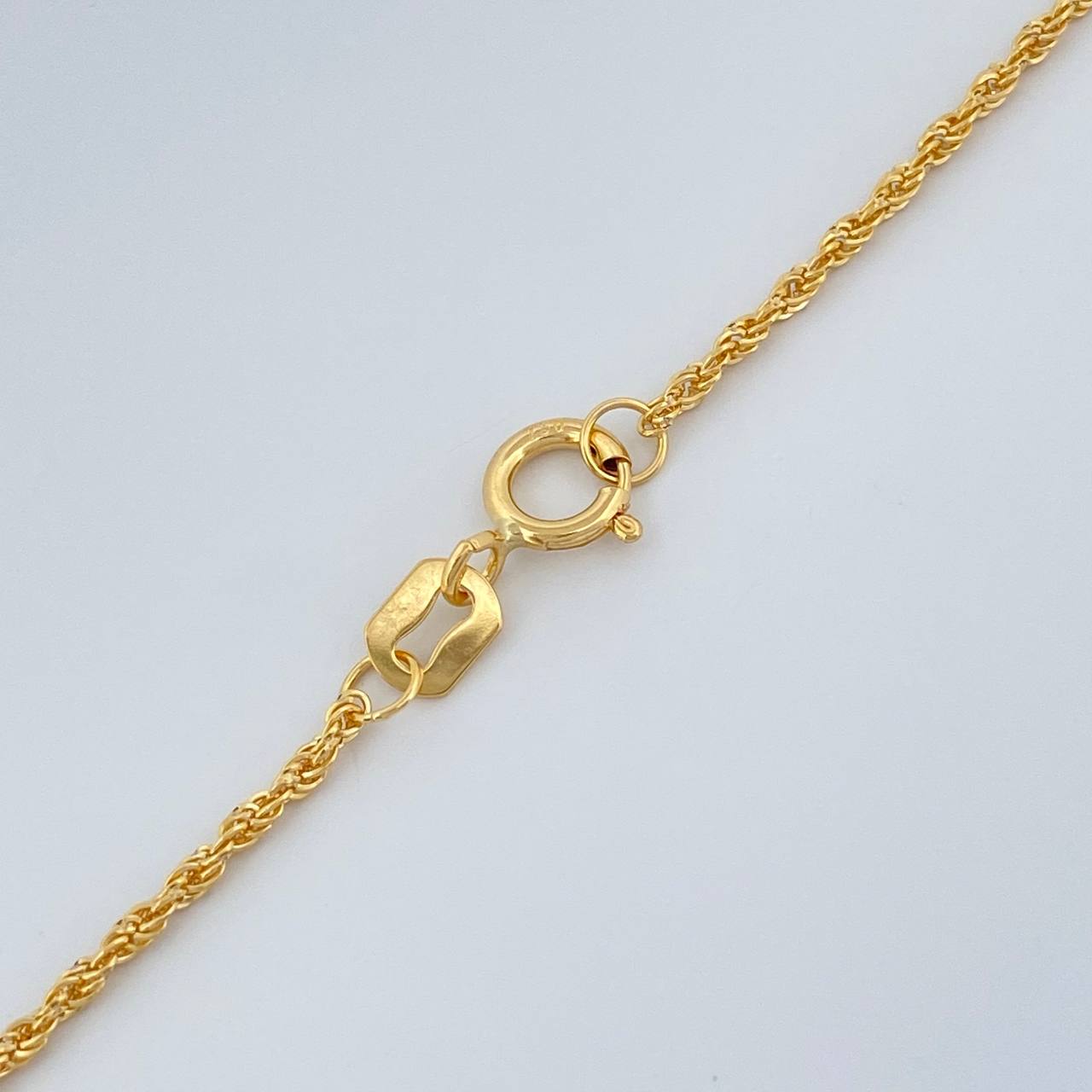 Set Cadena y Dije Lazo + Cruz Cristo 1.4gr / 15 3/4 in / 0.85mm Oro Amarillo 18K %