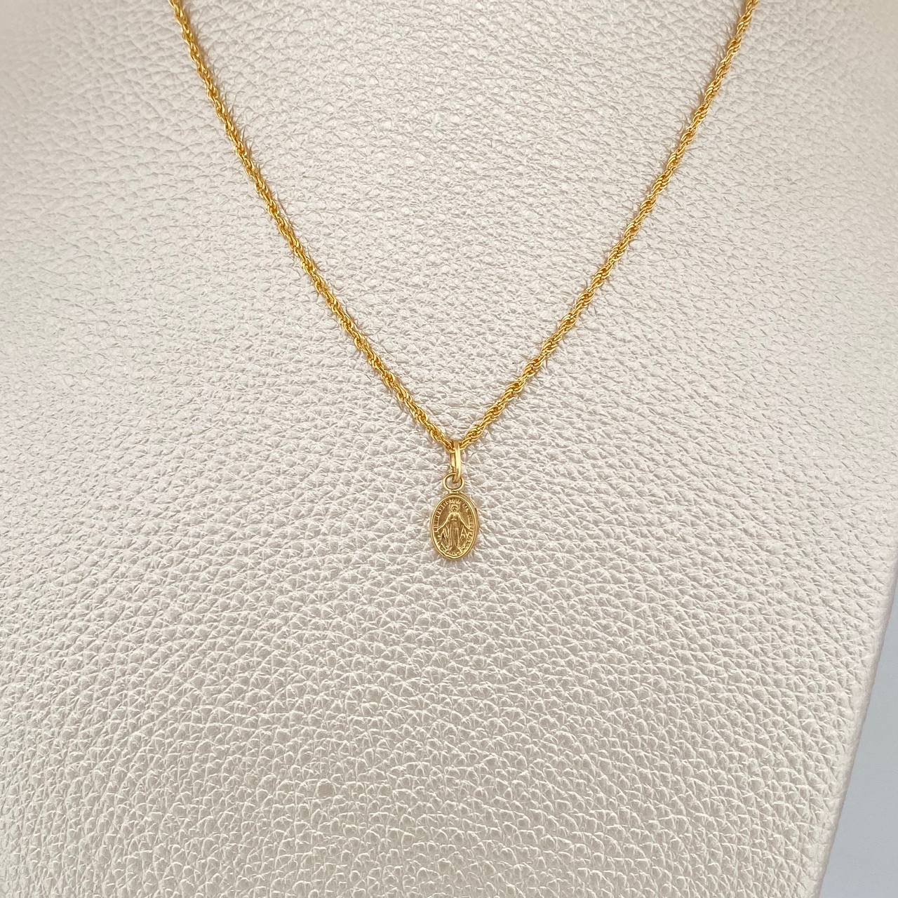 Set Cadena y Dije Lazo+ Virgen Milagrosa 1.4gr / 15 3/4 in / 1.44mm Oro Amarillo 18K $