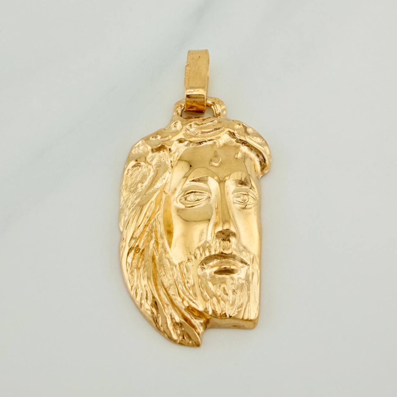 Dije Rostro Cristo 5.85gr / 1 3/4 in / Oro Amarillo  18K $