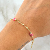 Pulso Espiga Tipo Militar 2.8gr / 18.5cm / 3mm Bolas Diamantadas Cauchos Fucsias Oro Amarillo 18K