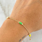 Pulso Espiga Bolas Emuladoras 2.45gr / 18cm / 3mm Diamantadas Cauchos Colores Oro Amarillo 18K