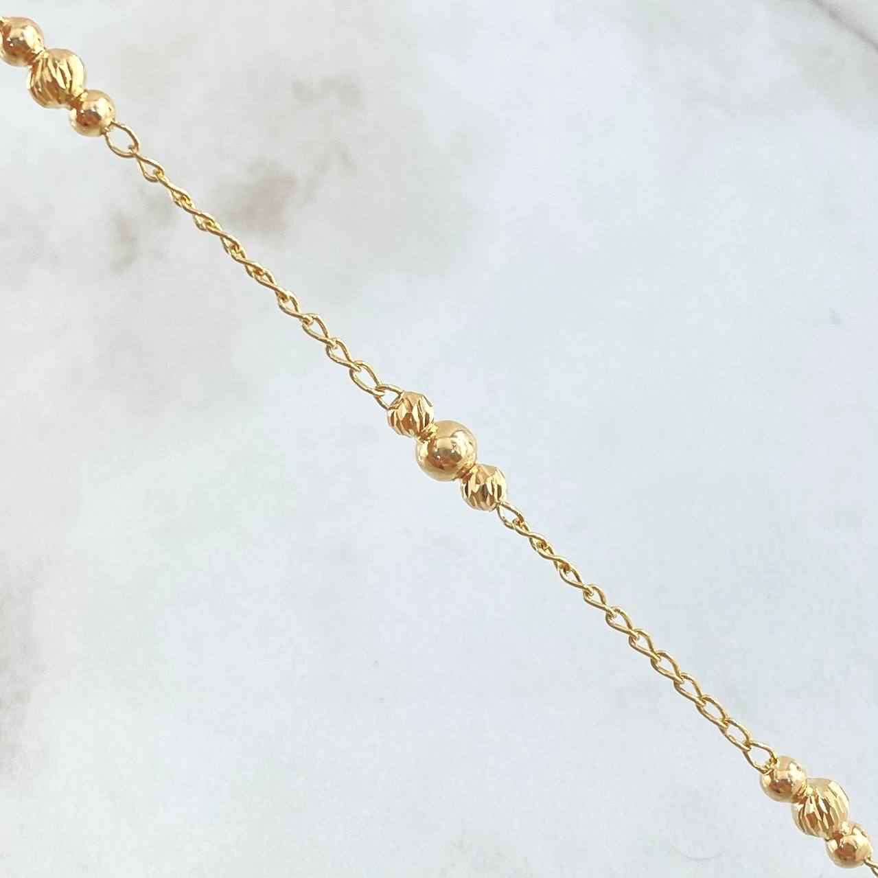 Military Spike Bracelet 2.4gr / 7.1in / 3mm-4mm Smooth Beads - Diamond-Cut 18K Yellow Gold