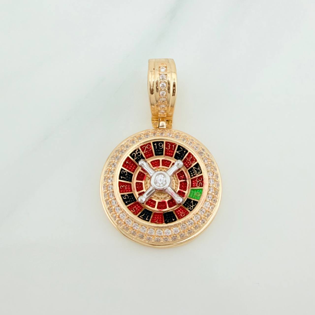Dije Ruleta 6.6gr / 1 1/4 in / Dos Oros Amarillo Blanco 18K %