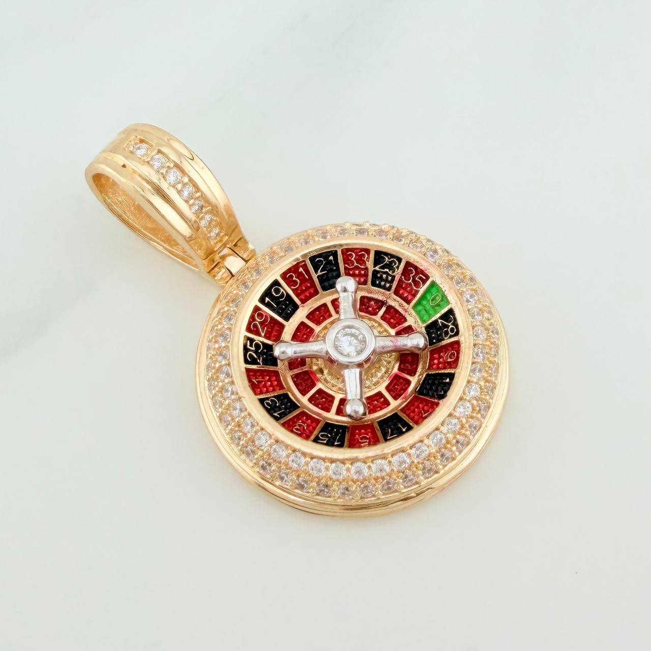Dije Ruleta 6.6gr / 1 1/4 in / Dos Oros Amarillo Blanco 18K %