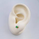 Topos Cuatro Garras Esmeralda 0.9gr / 3.7mm Oro Amarillo 18K $