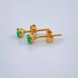 Topos Cuatro Garras Esmeralda 0.8gr / Oro Amarillo 18K &