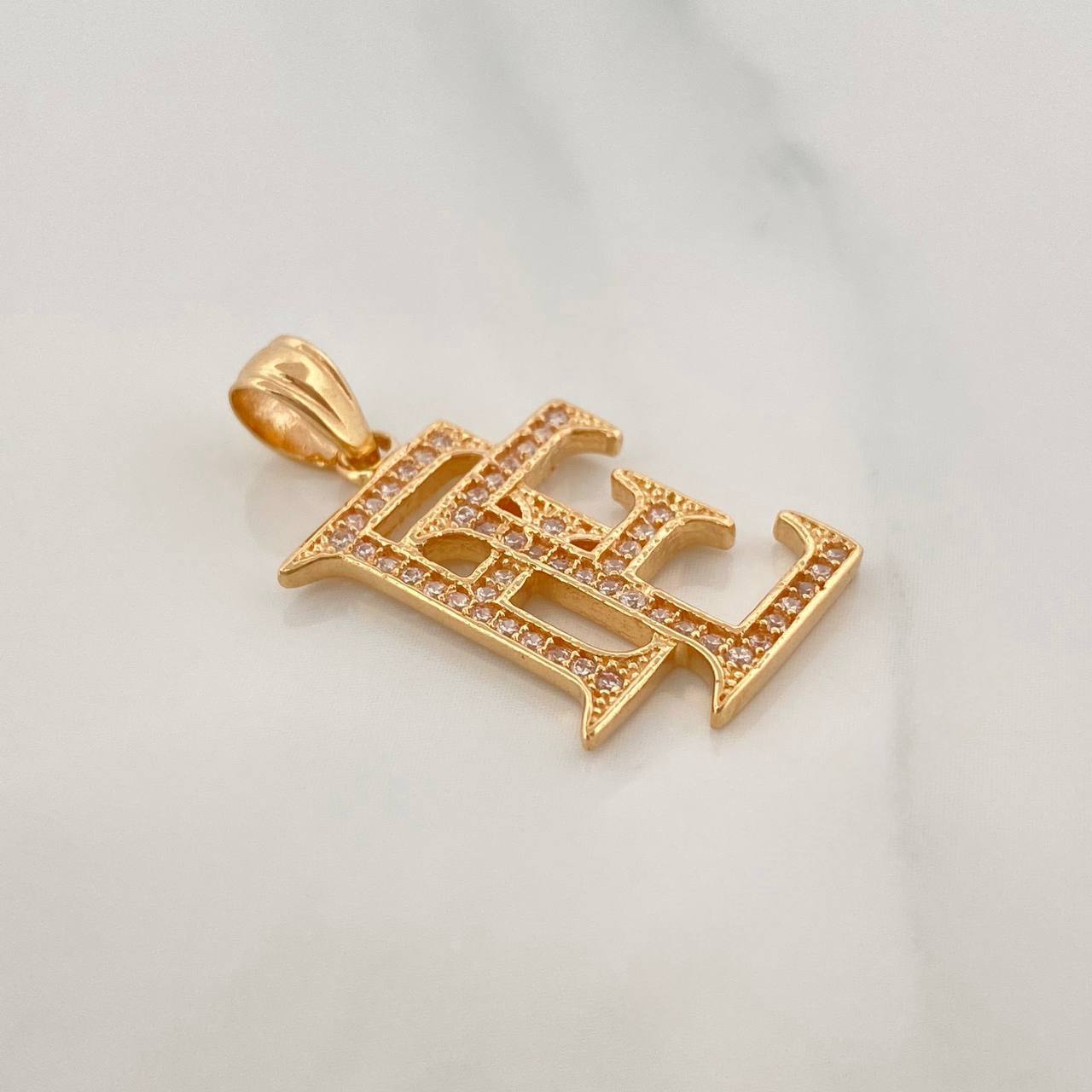Dije Fe 2.25 g / 1 in Oro Amarillo 18K