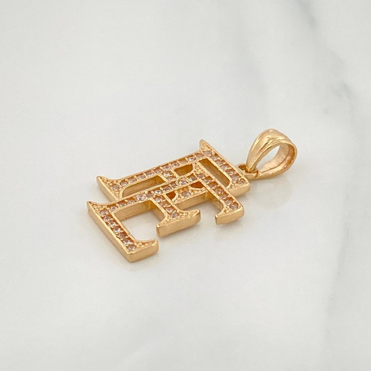 Dije Fe 2.25 g / 1 in Oro Amarillo 18K