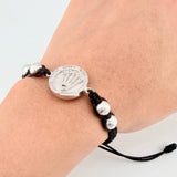 Pulsera Tejida Negra Circulo Corona Bolas Diamantadas Oro Blanco 18K