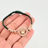 Pulsera Tejida Verde Circulo Corona Bolas Diamantadas Oro Rosa 18K