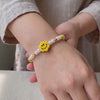 Pulsera Blanca Flor Carita Feliz 4mm Bolas Diamantadas 2 Und Oro Amarillo 18K (A.C)